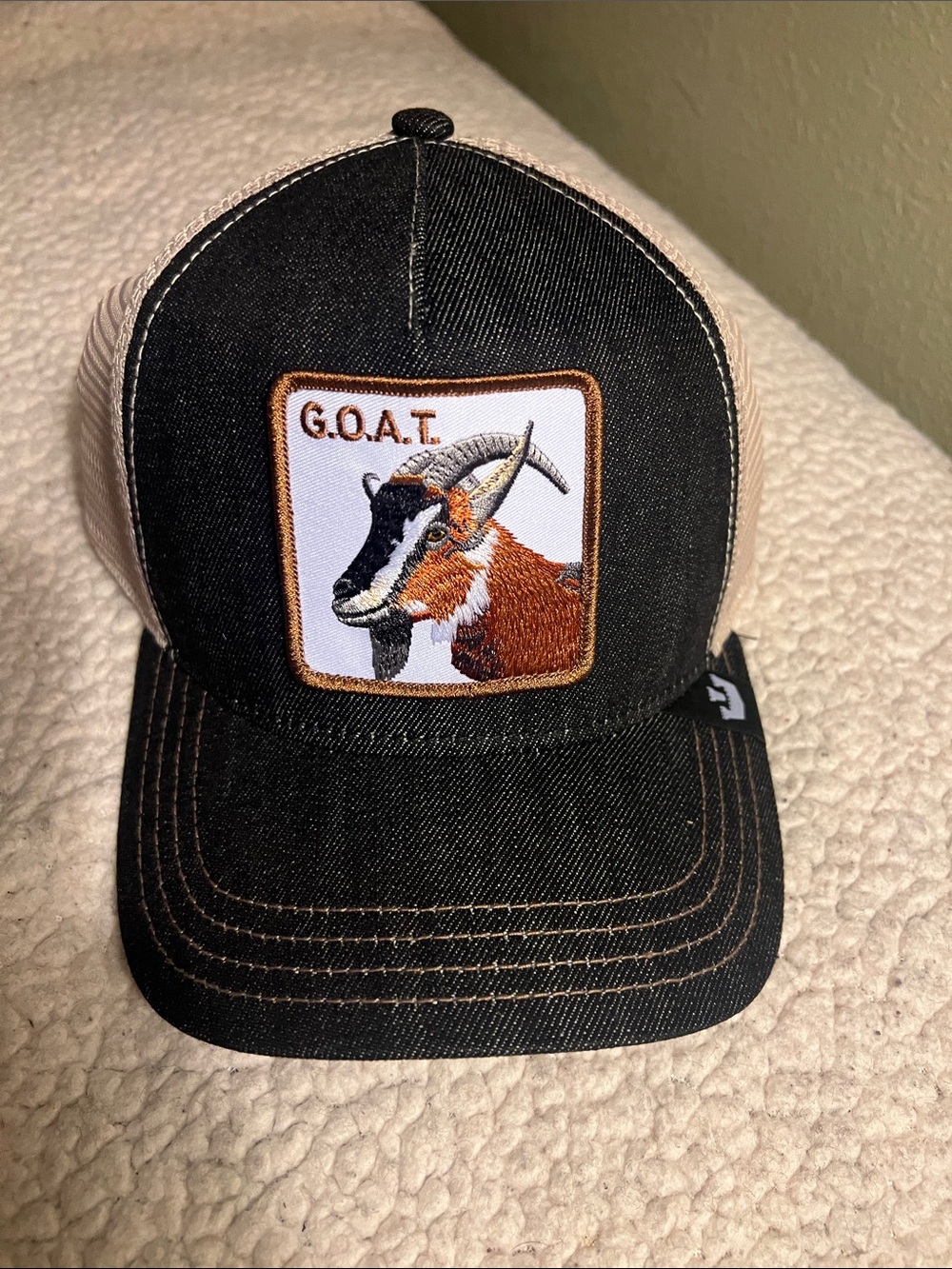 Goorin Bros Black and White 'G.O.A.T.' Patch Trucker Hat